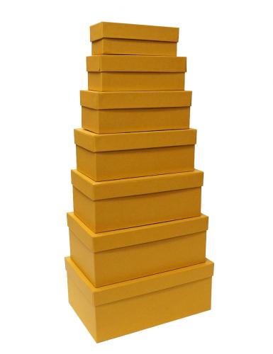 Набор из семи прямоугольных подарочных коробок жёлтого цвета, отделка матовой фактурной бумагой, размер 28*18*11,5 см.