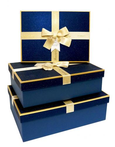 Набор из трёх прямоугольных подарочных коробок синего цвета, отделка мерцающей блестящей бумагой, бант из ленты, размер 29*21*9,5 см.