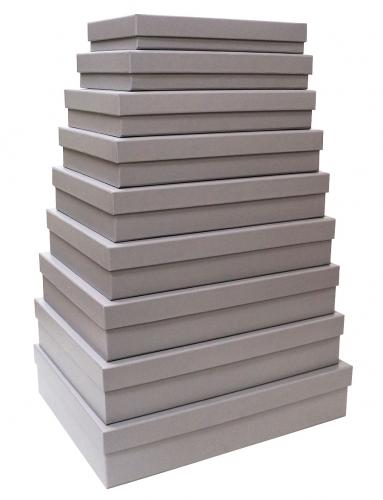 Набор из девяти плоских прямоугольных подарочных коробок светло-серого цвета, отделка матовой бумагой, размер 44*34,5*9,5 см.